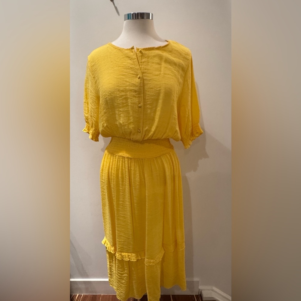 Nanette Lepore butter yellow w. slip.
TBH: if u are a tall 10-12, OK.
Size 14.